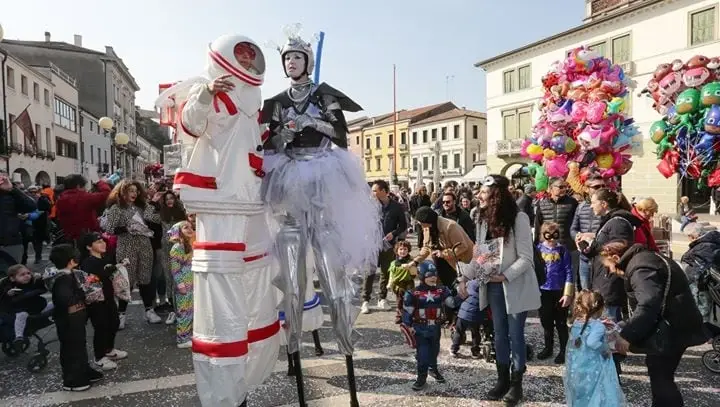 Venice Carnival stilt walkers