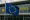 EU flag outside airport departures hall